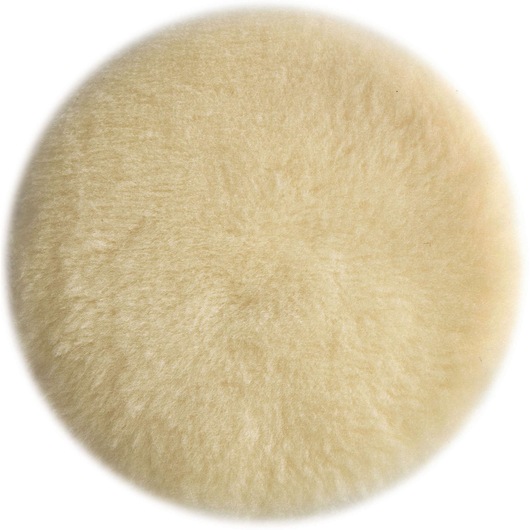 A close-up image of a round, beige, wool polishing pad with a fluffy texture, typically used for buffing and polishing surfaces.