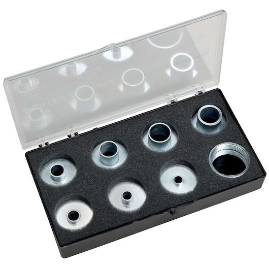 A set of metal adapter rings in a black case with a clear plastic lid. The adapters are organized in a foam insert, with various sizes and shapes visible.