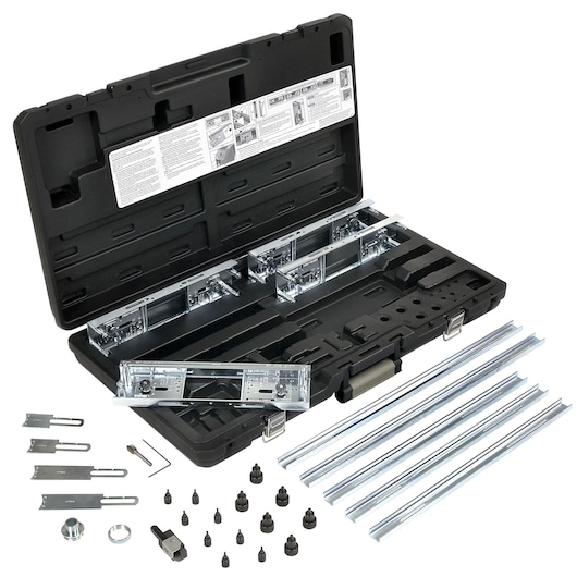 A product image showing an open black carrying case containing a PORTER-CABLE photography tool kit. The case holds various metal components, guides, and attachments, with additional metal rods, fasteners, and parts arranged in front. Instruction sheets are placed inside the lid.