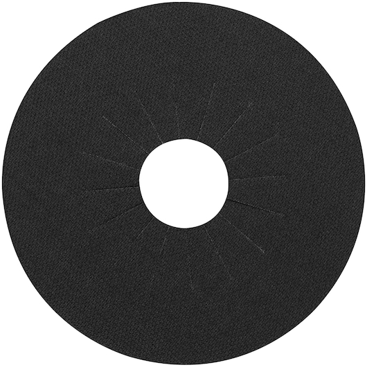 A black, circular protective disc with a textured surface and a hole in the center, used for photography equipment. The disc features radial slits around the inner hole.