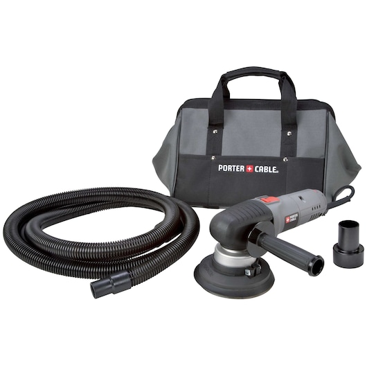 PORTER-CABLE power sander kit, including a gray and black sander with a side handle, a flexible black hose, a carrying bag with PORTER-CABLE logo, and two black hose adapters, all arranged on a white background.