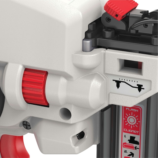 Close-up view of a PORTER-CABLE PCC790B tool, featuring a gray body with red adjustment knobs and levers. The image shows details such as a dial, lever, and warning/operation stickers with icons and instructions.