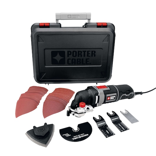 PORTER-CABLE oscillating tool kit including a black hard carrying case, multiple sanding pads, various blade attachments, and a corded power tool placed in front of the case.