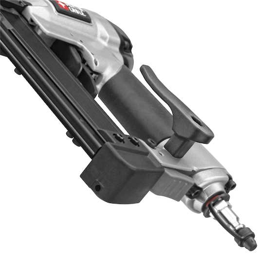 Close-up of a PORTER-CABLE pneumatic pin nailer tool, showing the handle, trigger, and nail magazine against a white background.